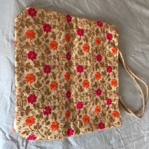 Indian flower and gold leaves tote bag